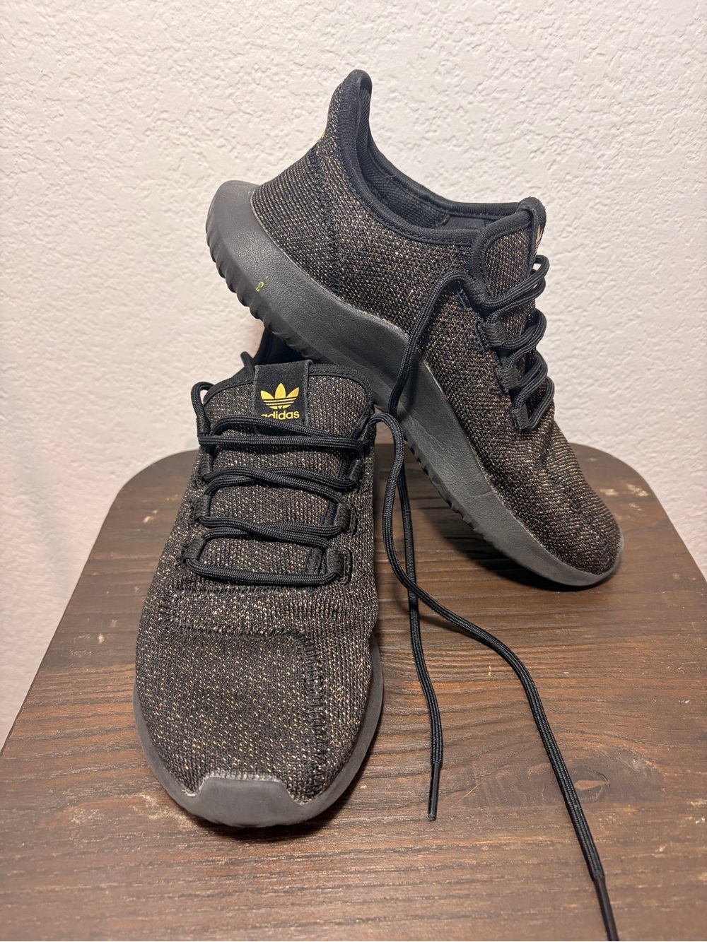 adidas Women’s Black Knit Sneakers with Subtle Gold Accents
